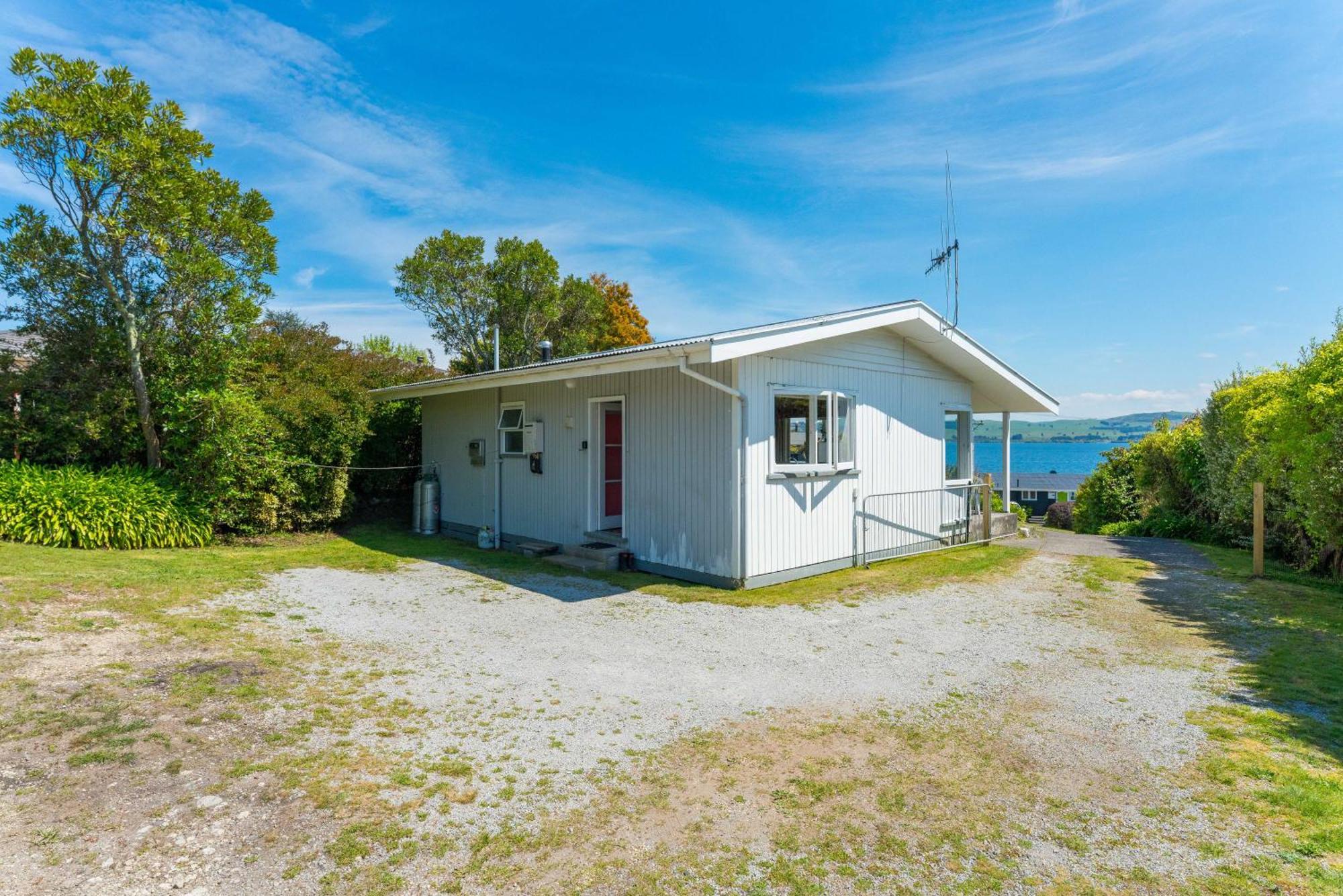 Lakeview Cottage - Rainbow Point Holiday Home Lago Lago Taupo Exterior foto